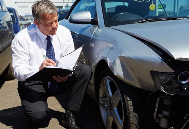 family reviewing car insurance coverage at kitchen table